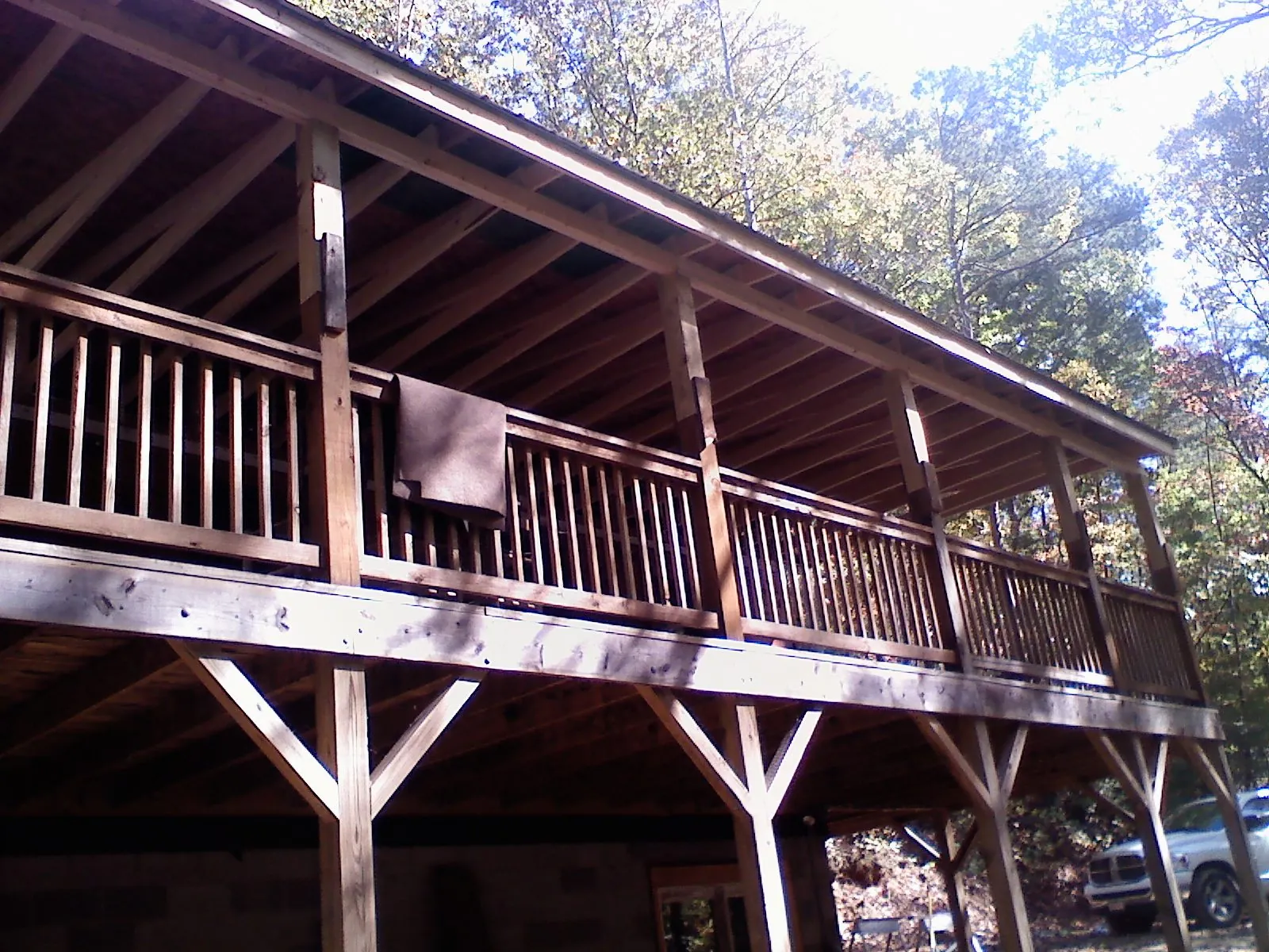 Timber framing under a new elevated porch and deck — Roof Leak Repair in Clarksburg by Roofing Brothers